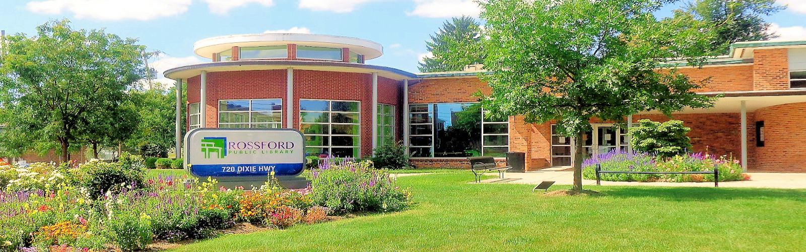 Front of the library building in spring